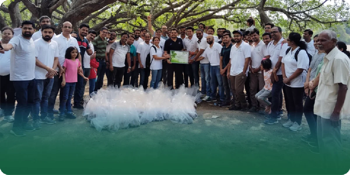Group of volunteers gathered after a seedball plantation activity, showcasing community participation in reforestation efforts